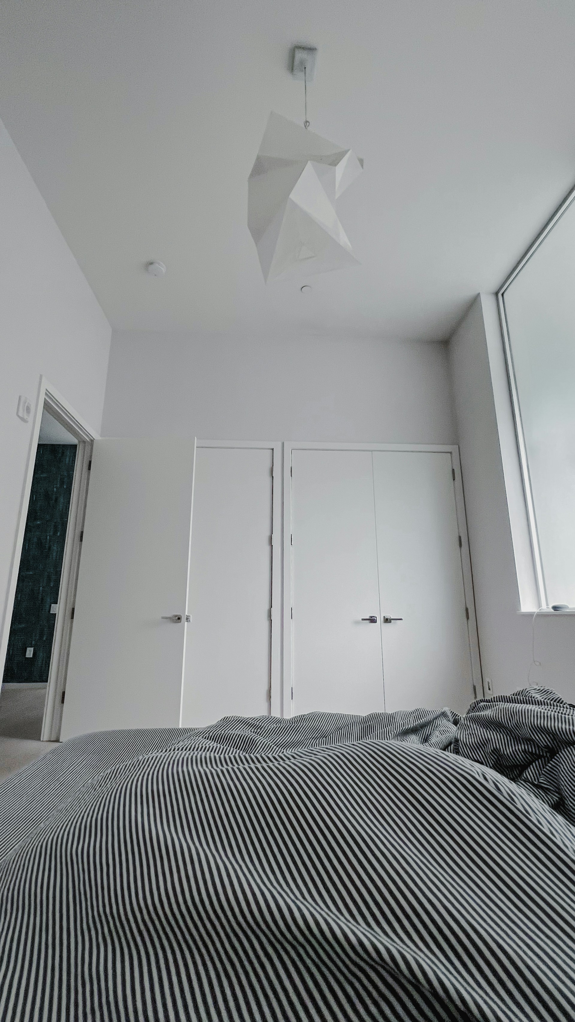 woman wearing yellow long-sleeved dress under white clouds and blue sky during daytime