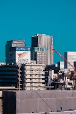 Hands exchanging goods symbolizing trading activities with an Australian city skyline in the background.
