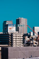 Hands exchanging goods symbolizing trading activities with an Australian city skyline in the background.