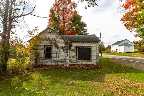 a small house with a garage