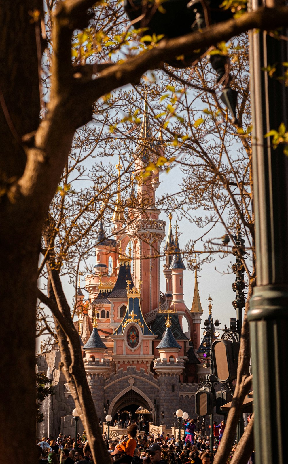 a castle with many people in front of it