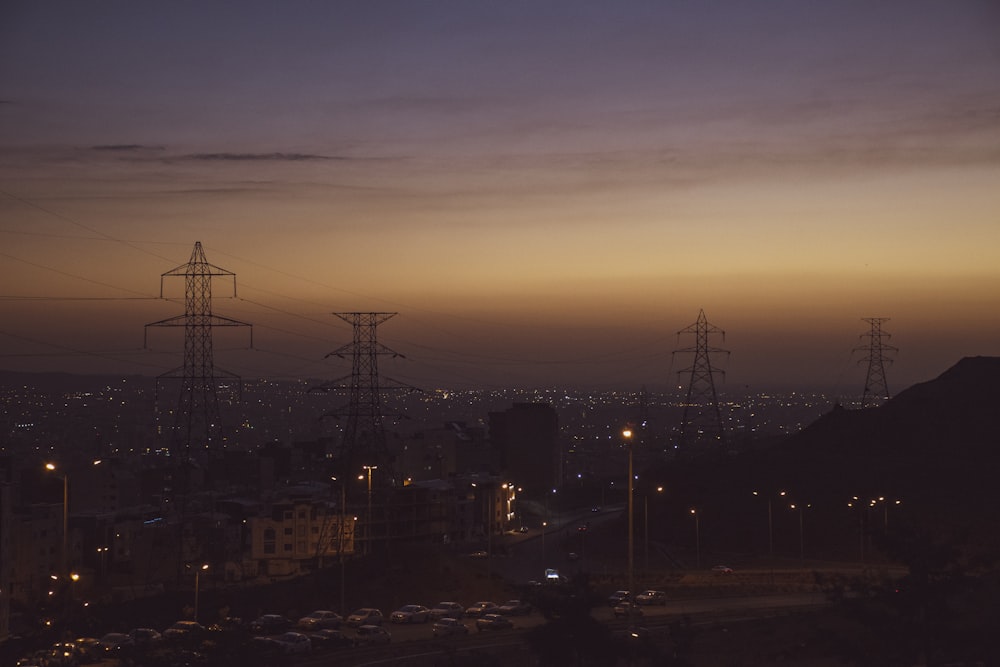 a city with power lines and towers