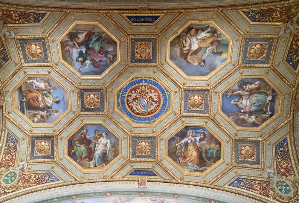 a ceiling with paintings on it