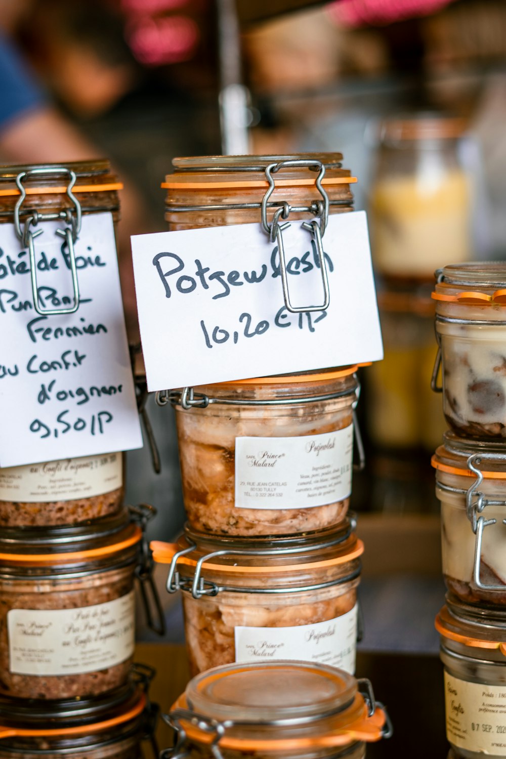 a group of jars with labels