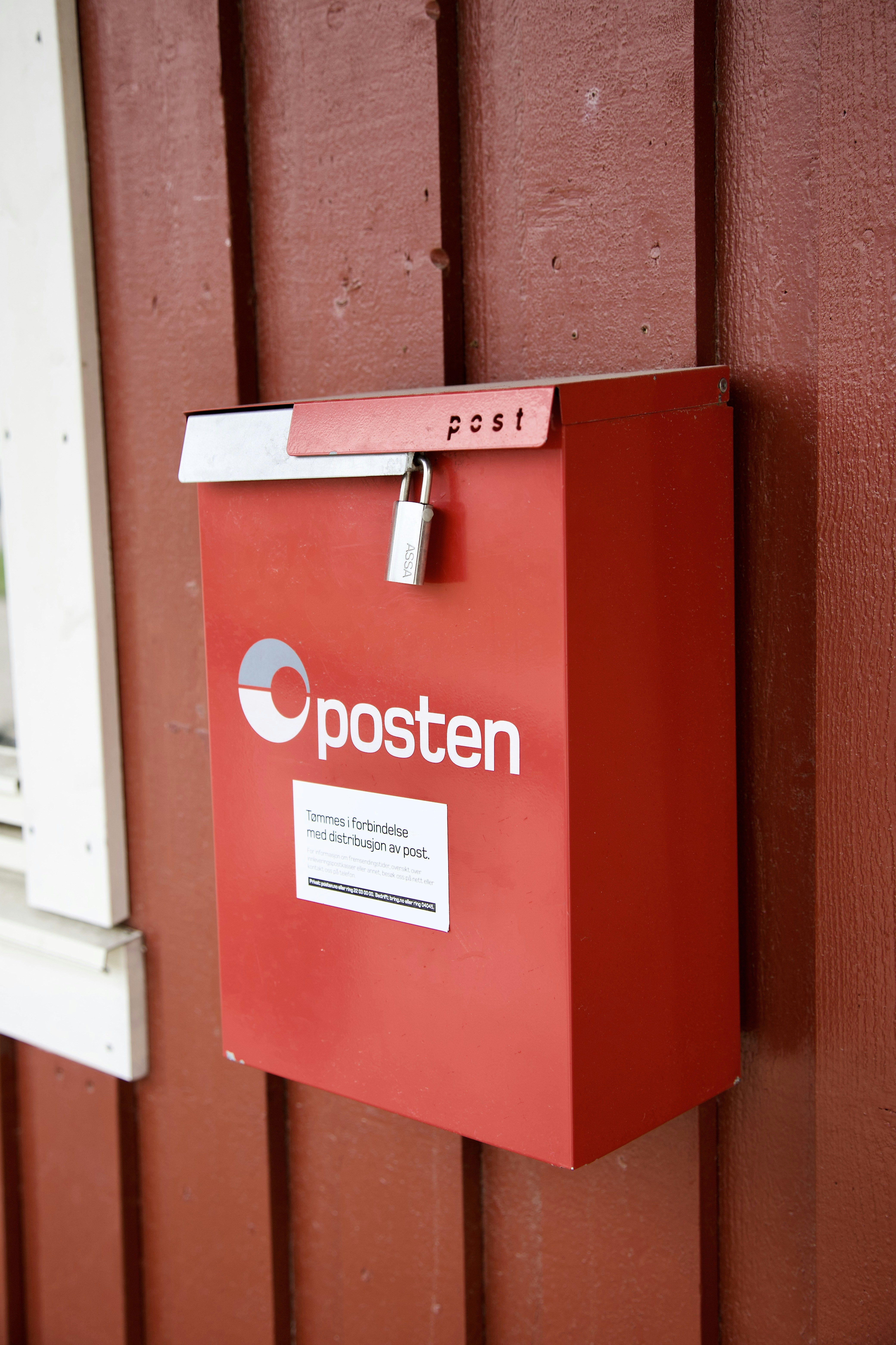 a red box with a sign on it