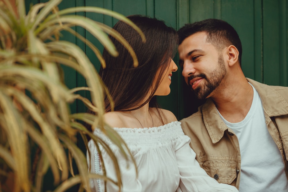 a man and woman kissing