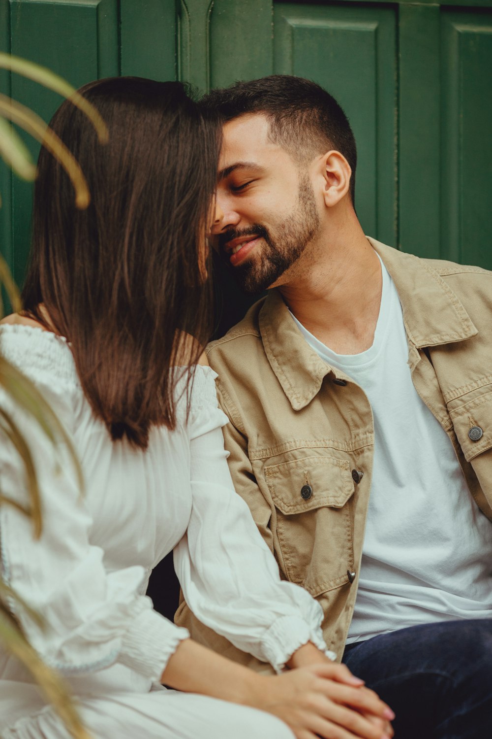 a man and woman kissing