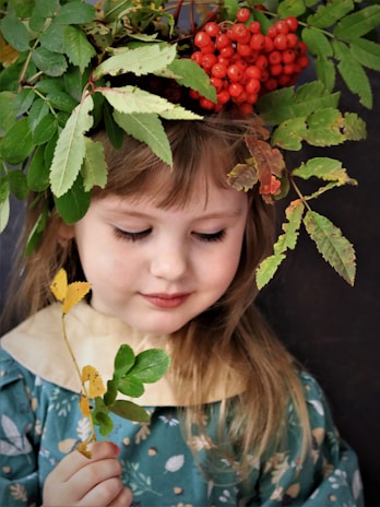 a girl with a flower in her hair