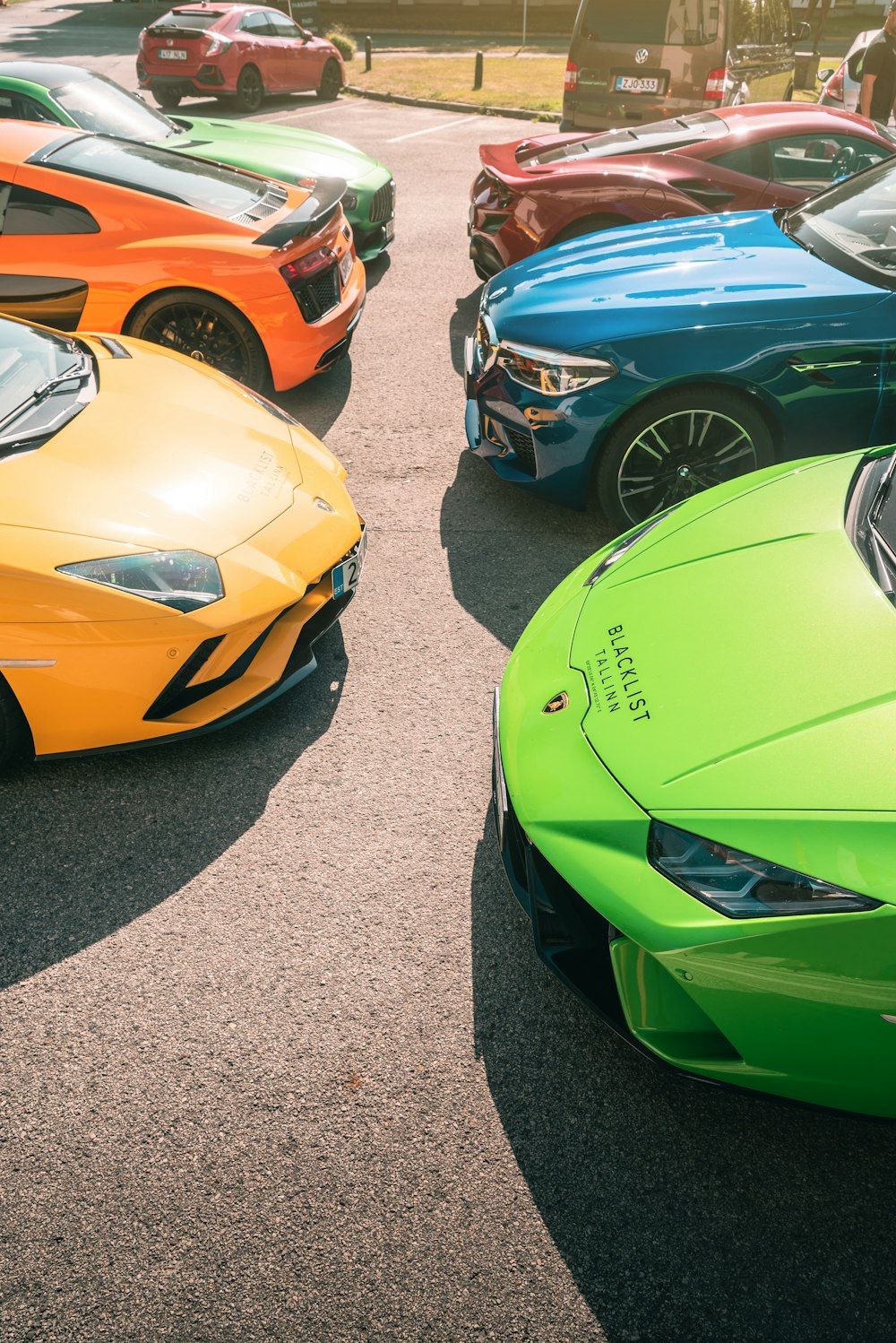 a group of cars parked in a parking lot