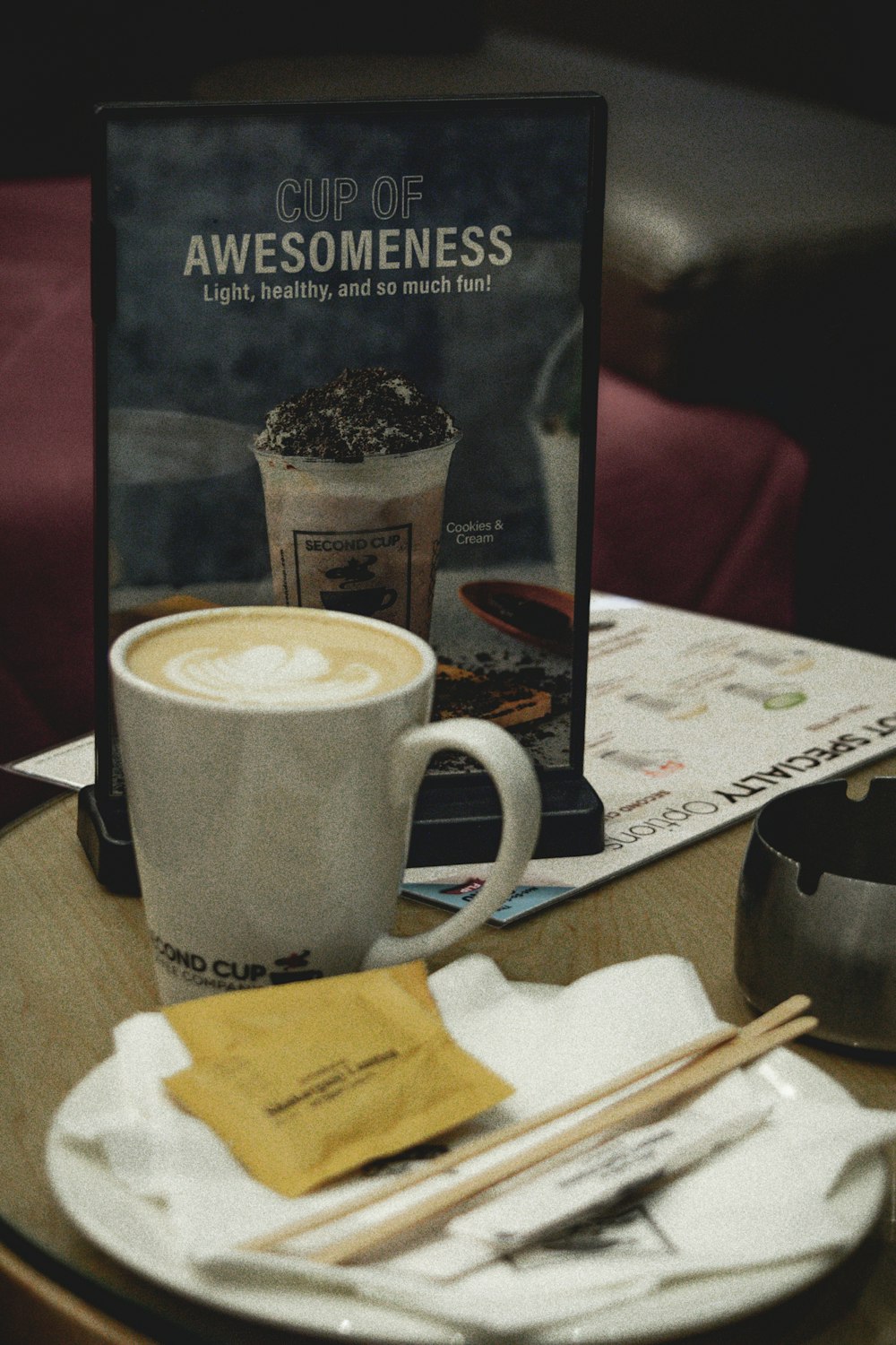 a mug of coffee and a book