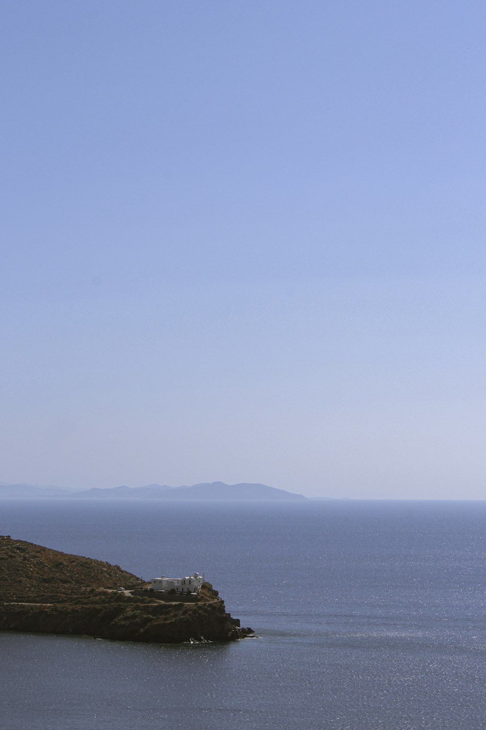 a body of water with land in the distance