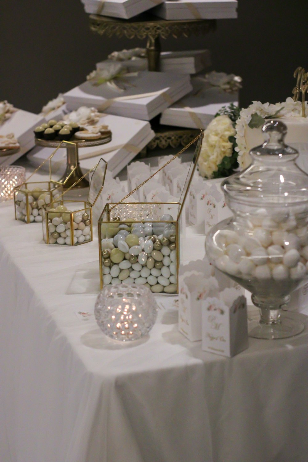 a table with many white and gold objects on it