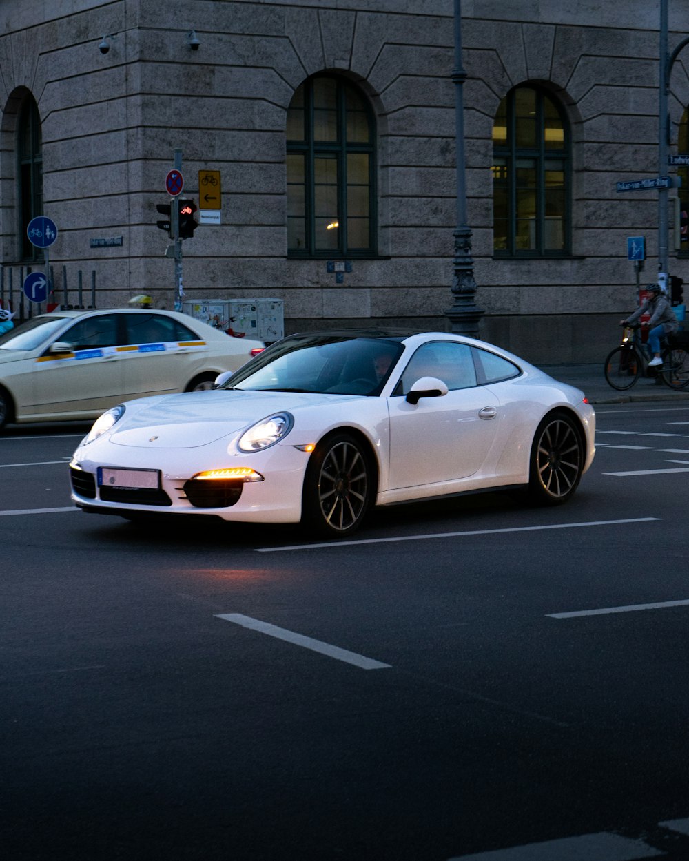 a white sports car on the street