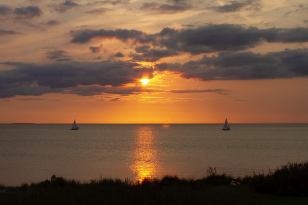 a sunset over a body of water