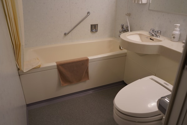 Clean modern bathroom after plumbing installation