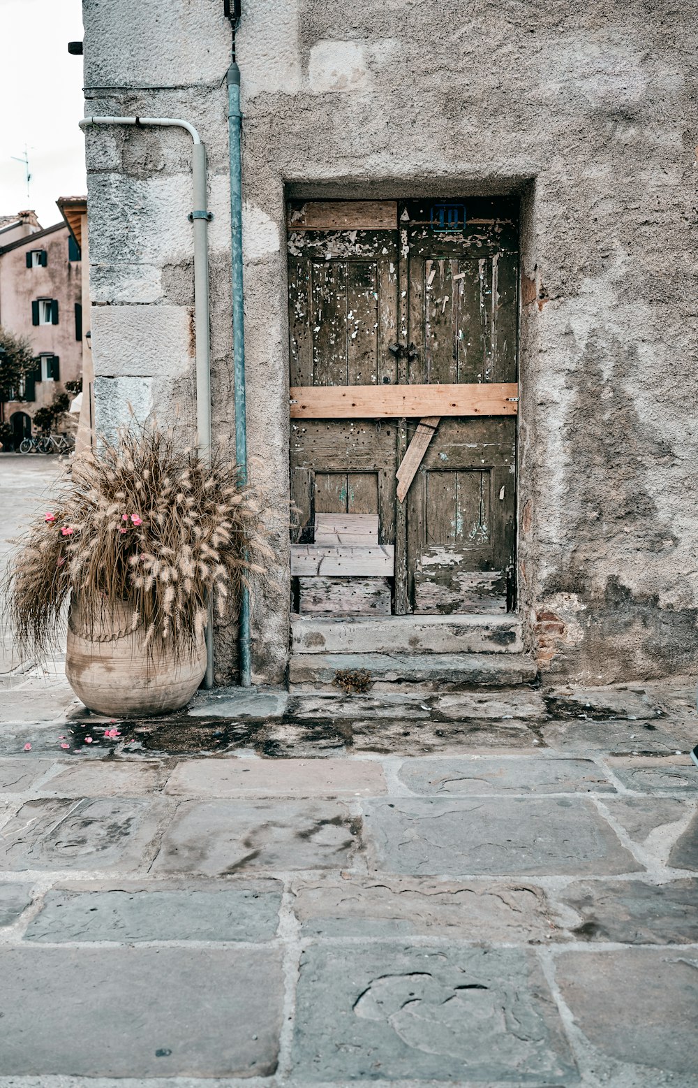 a door on a stone building