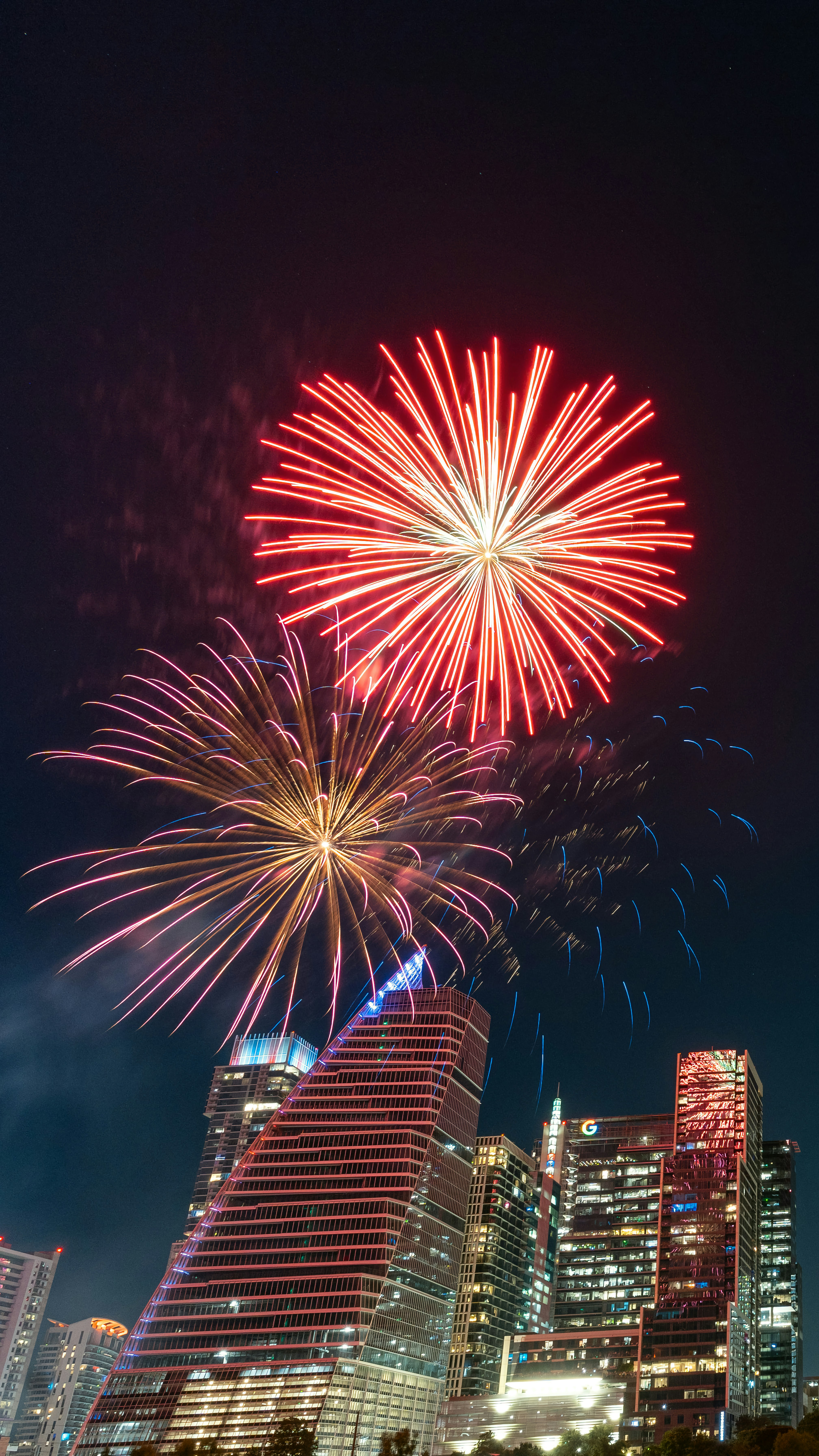 fireworks in the sky over a city