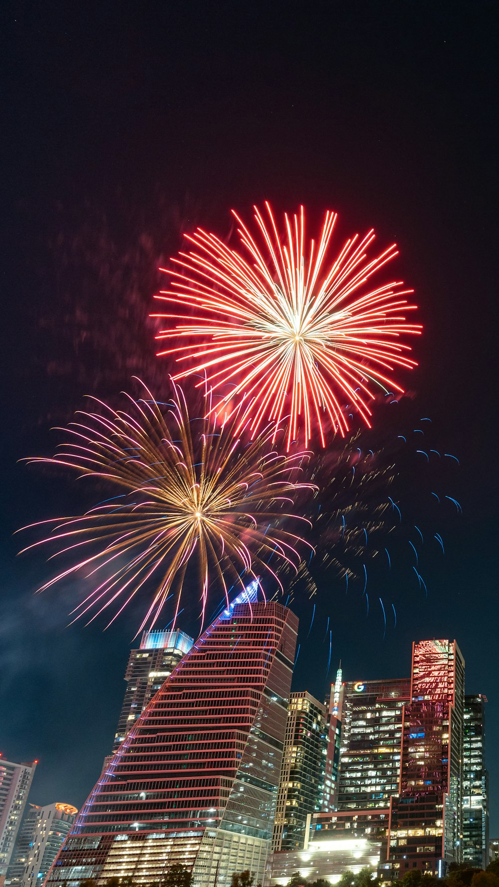 fireworks in the sky over a city