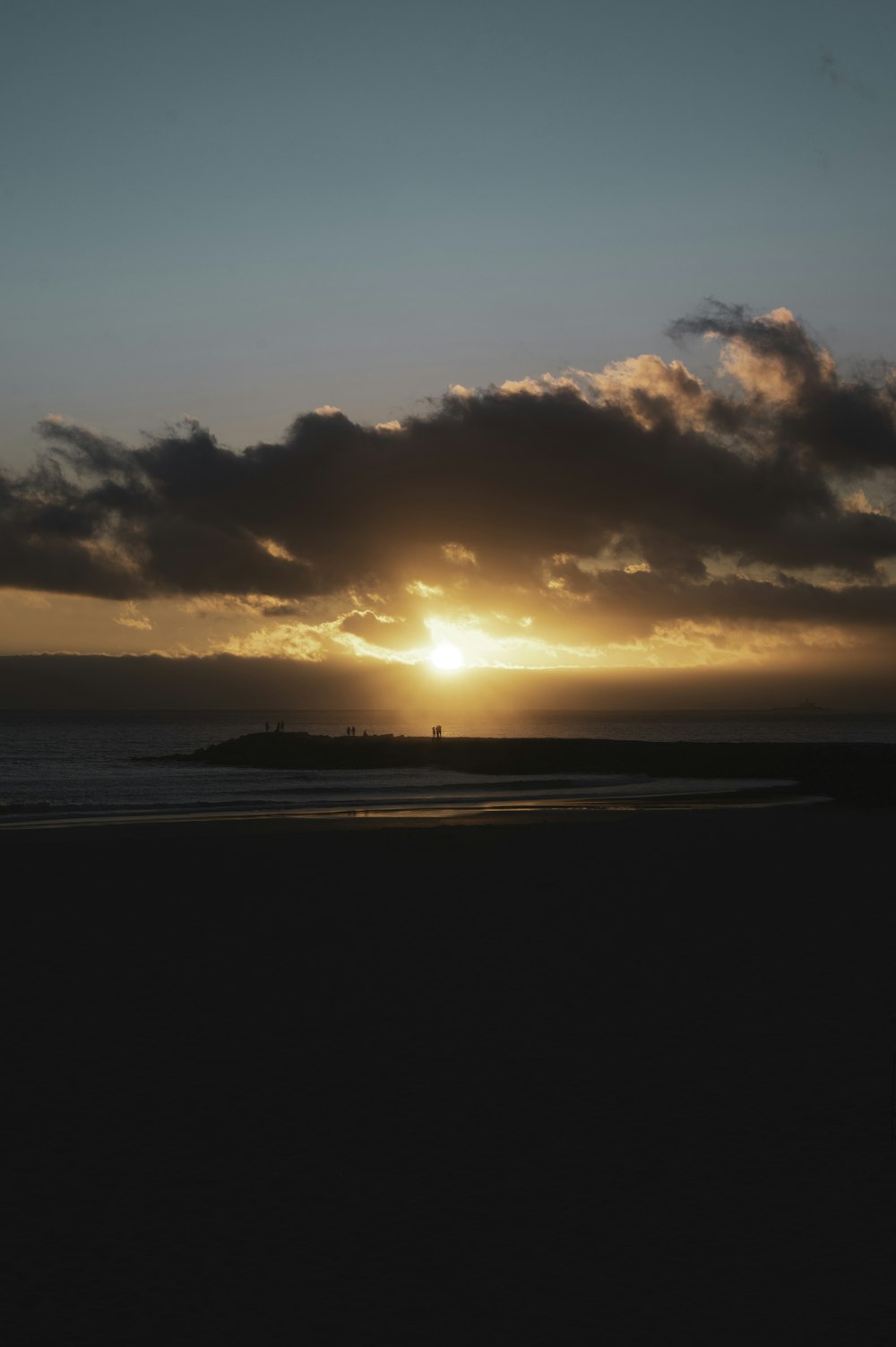 a sunset over a beach