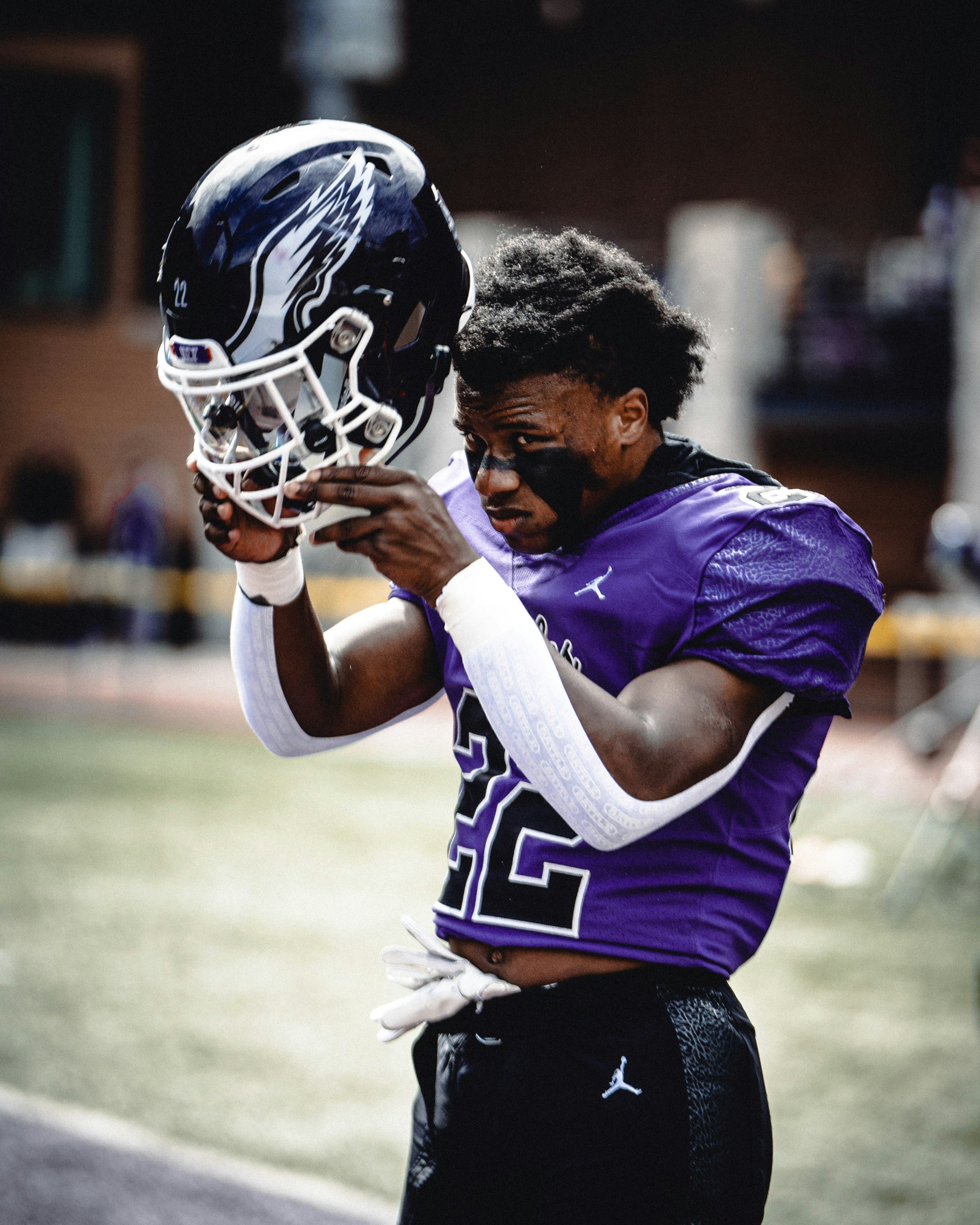 a person holding a football