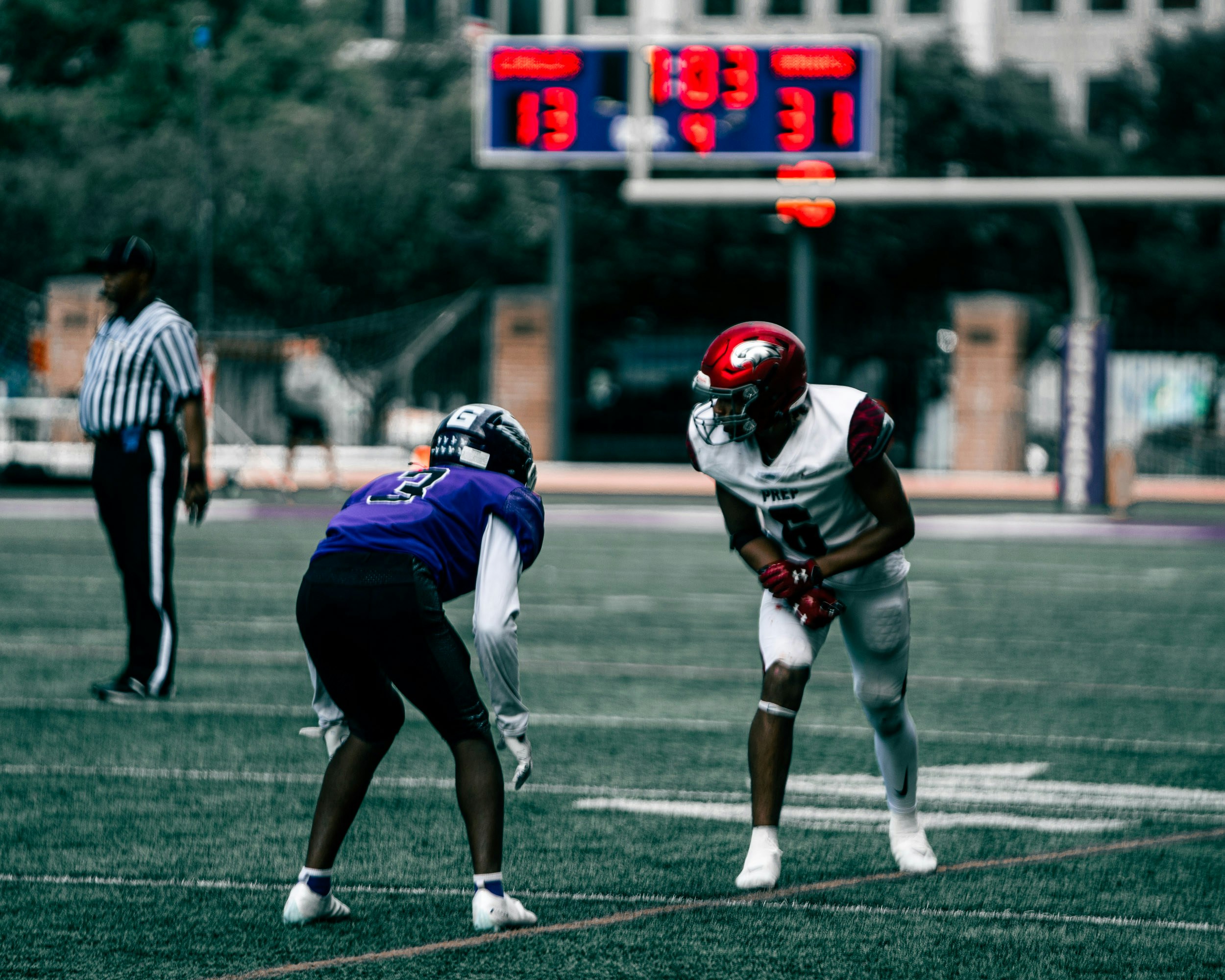 a football player running towards the goal