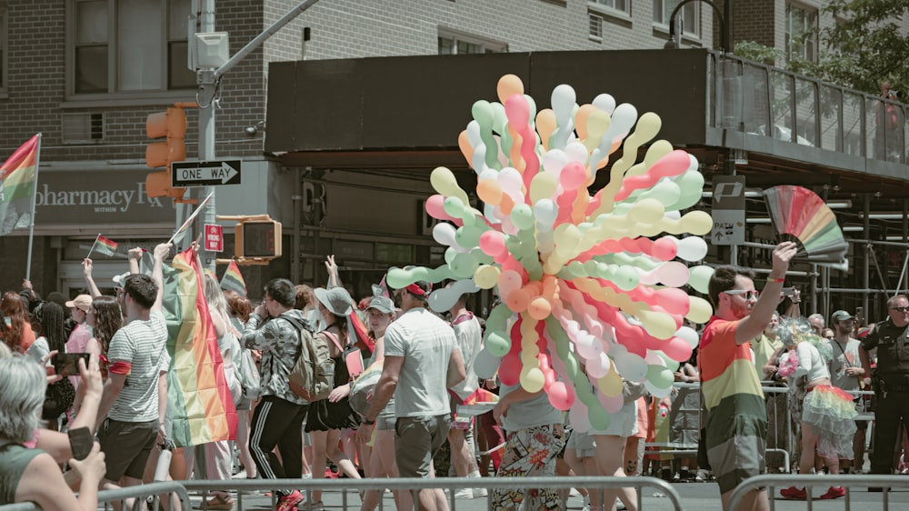 a group of people holding balloons