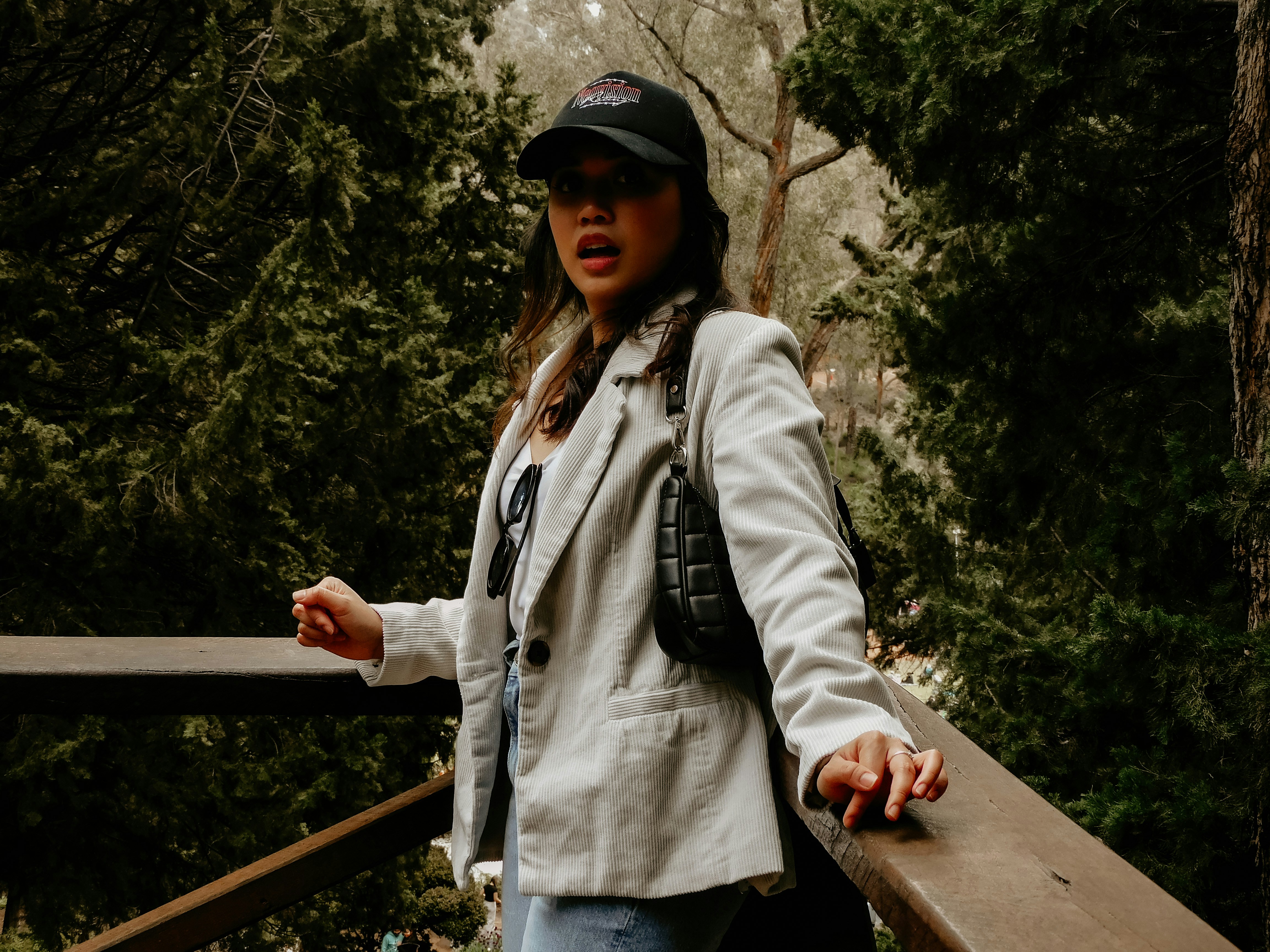 a person wearing sunglasses and a hat