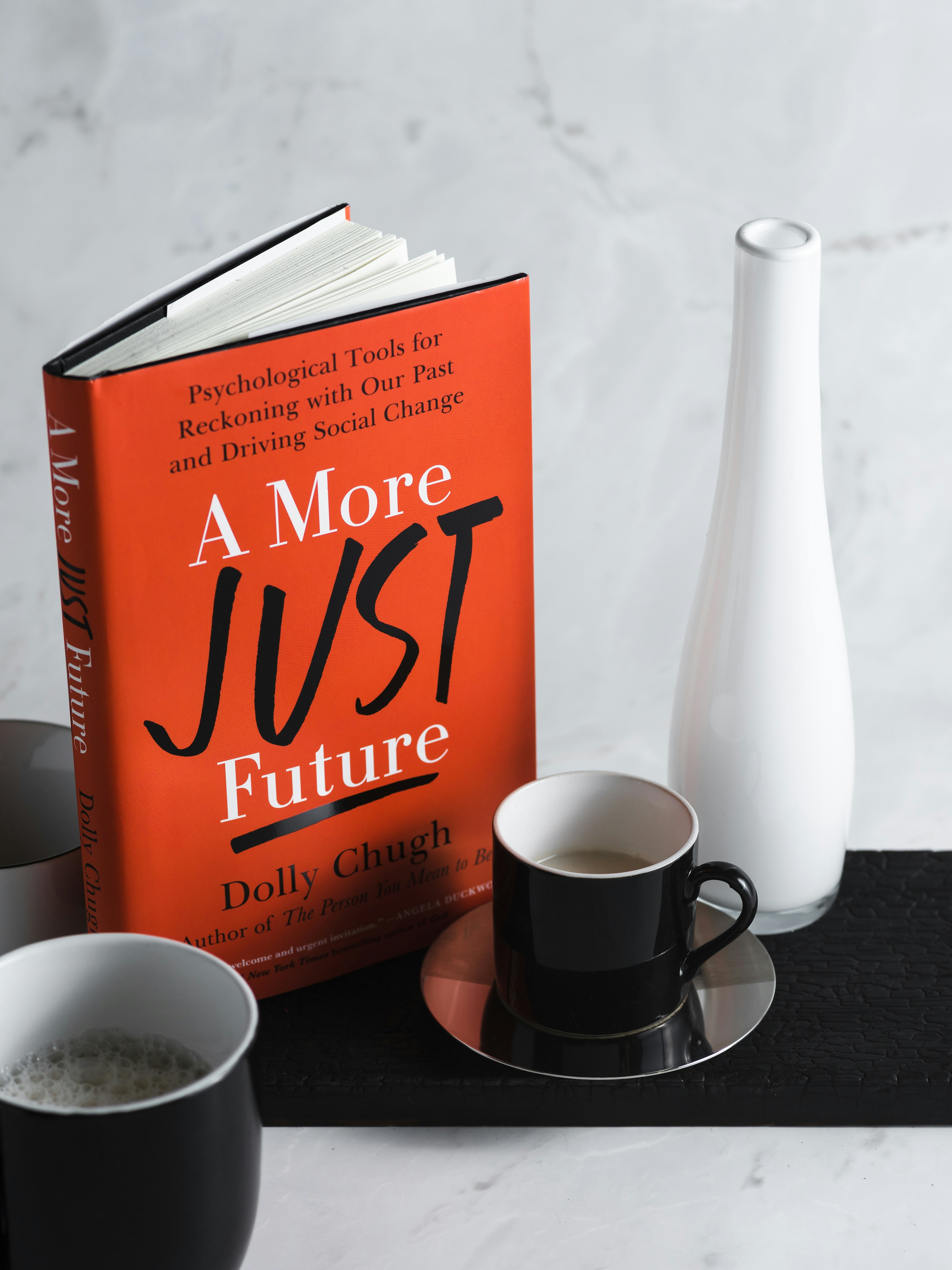 a book and a cup of coffee