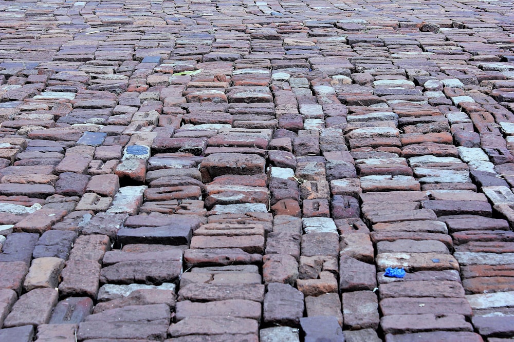 a cobblestone road with a cobblestone cobblestone cobblestone road