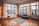 A clean and modern living room with fresh air flowing through vents.