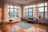 A clean and modern living room with fresh air flowing through vents.