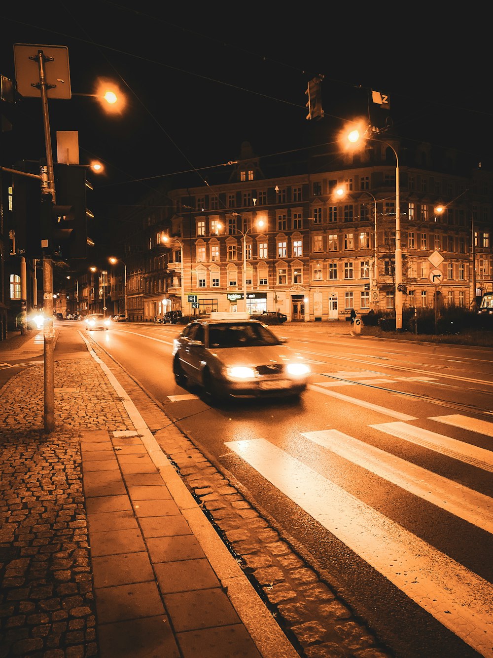 a car driving down a street