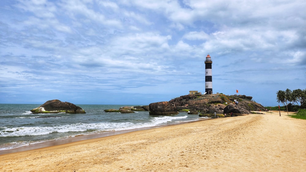 a lighthouse on a beach