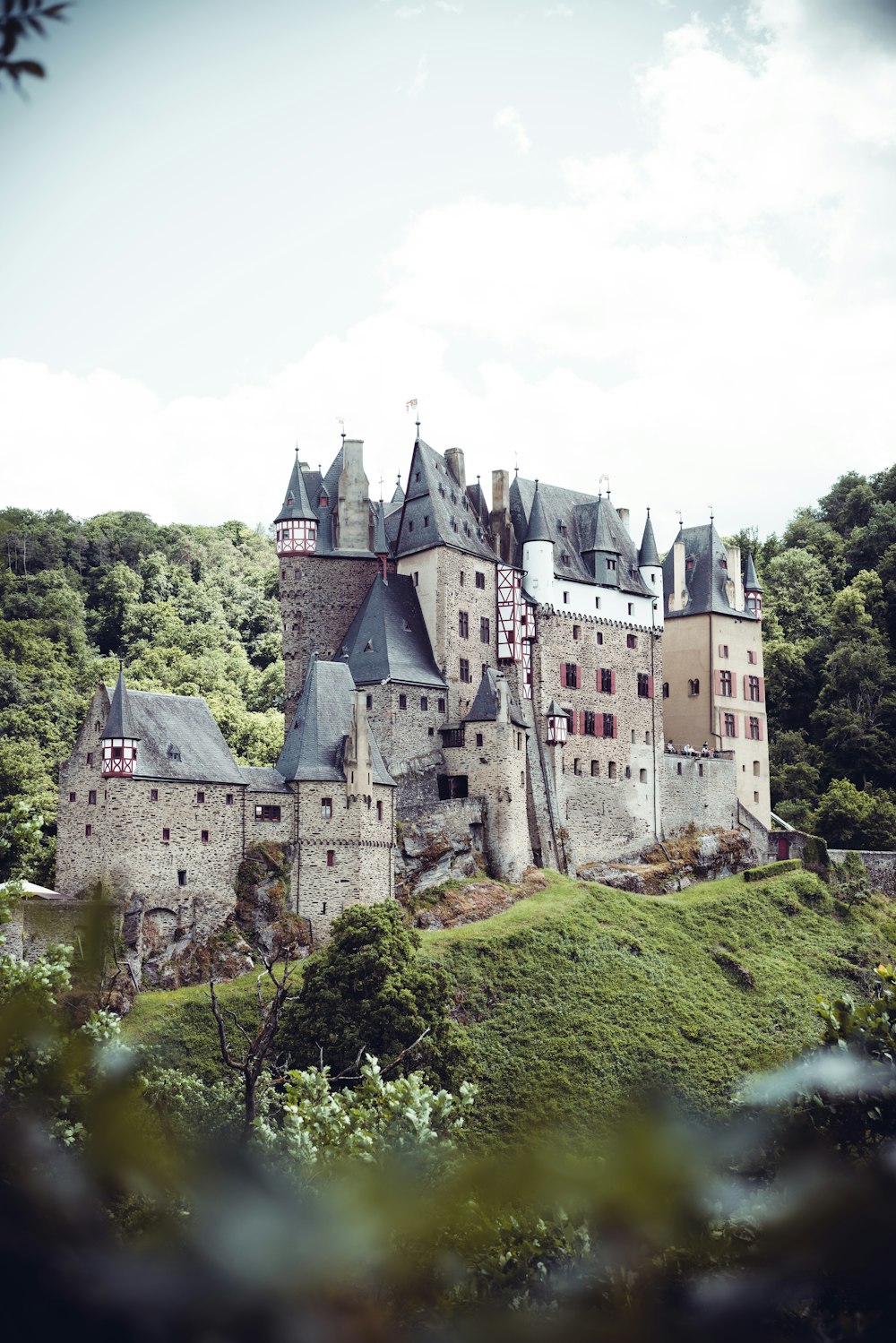 a large castle on a hill