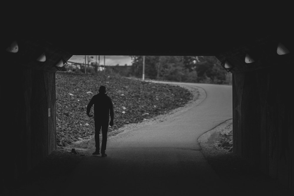 a man walking down a road