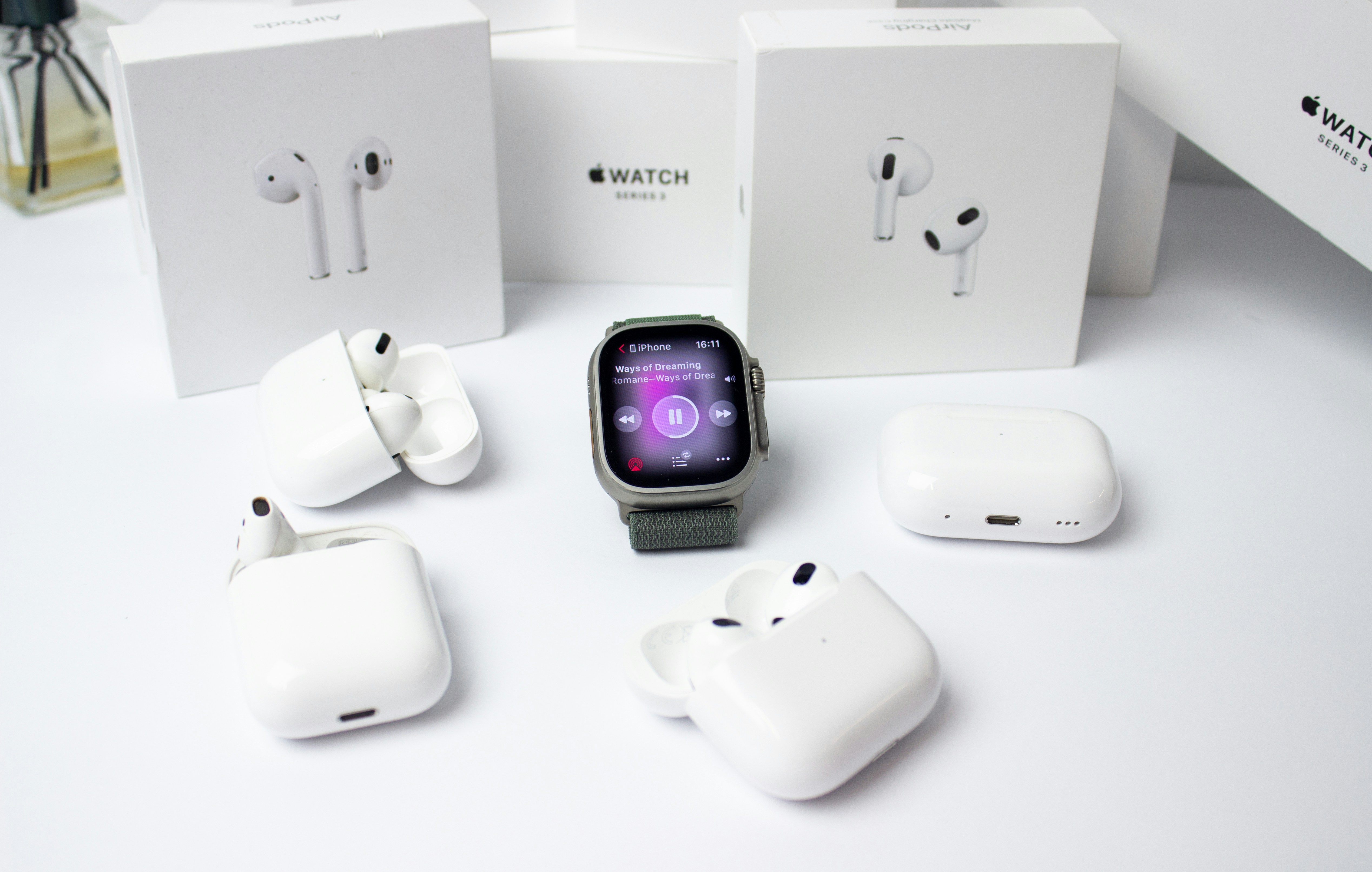 Premium wireless headphones and earbuds collection featuring Sony, Bose, and Apple AirPods for audio quality comparison