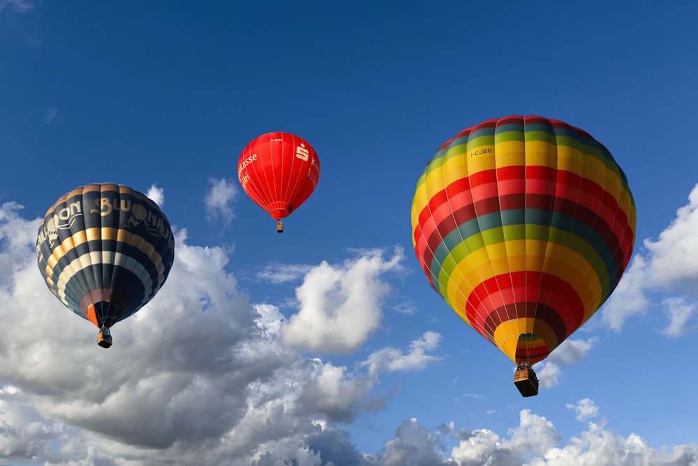 a group of hot air balloons in the sky