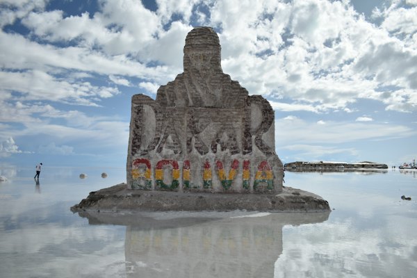 A large stone structure in the water — Salar de Uyuni, Bolivia