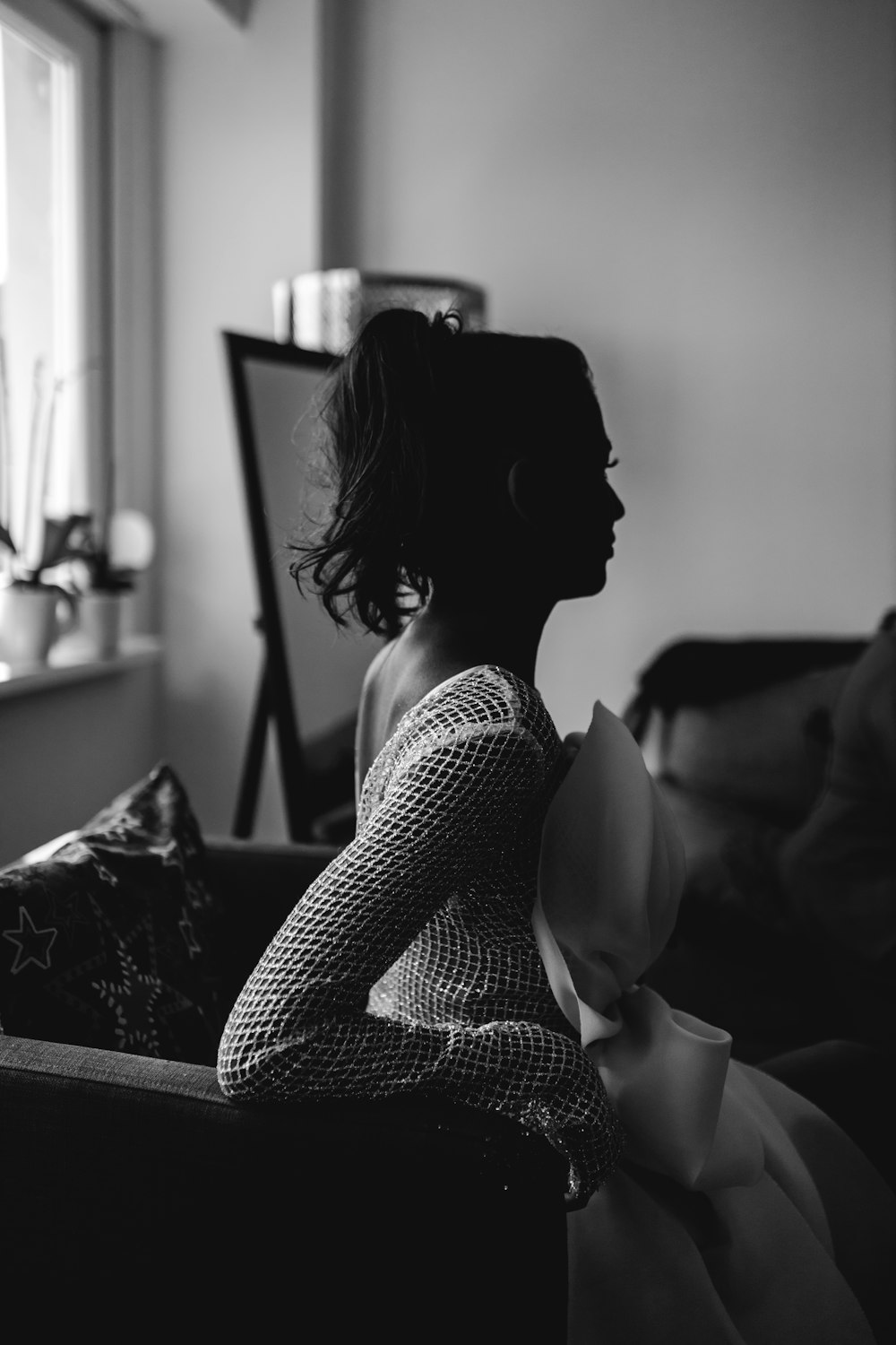 a woman sitting on a couch