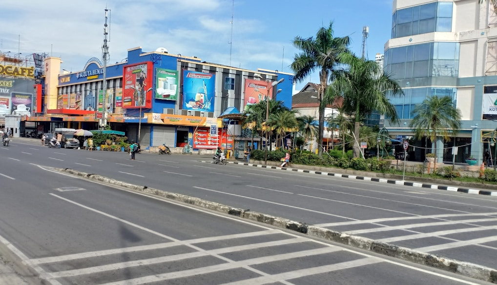 a street with buildings and trees