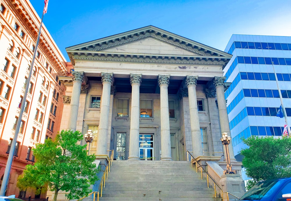 a building with columns and a staircase