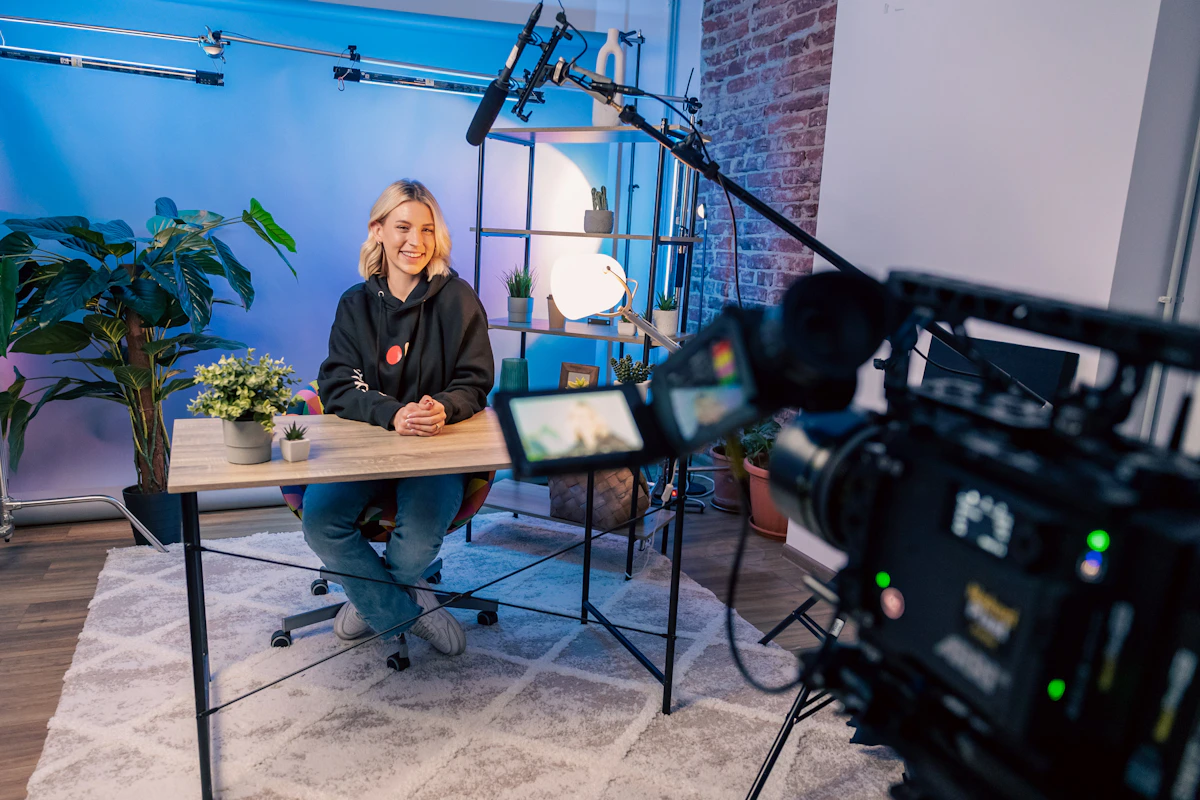 Creator studio setup with camera, microphone, monitor and keyboard