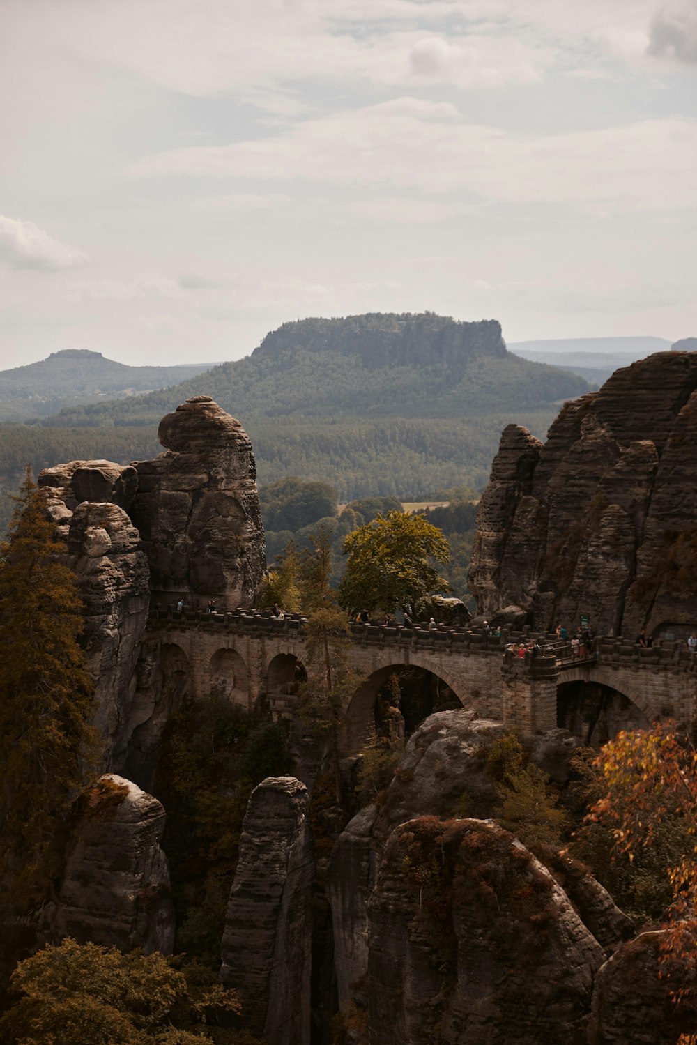 a stone bridge over a canyon