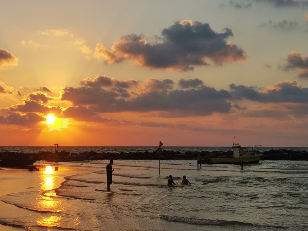 a group of people on a beach