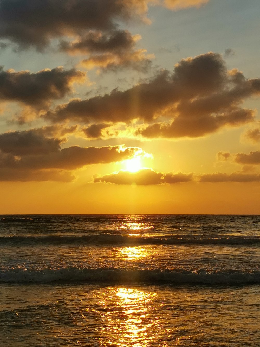 a sunset over the ocean