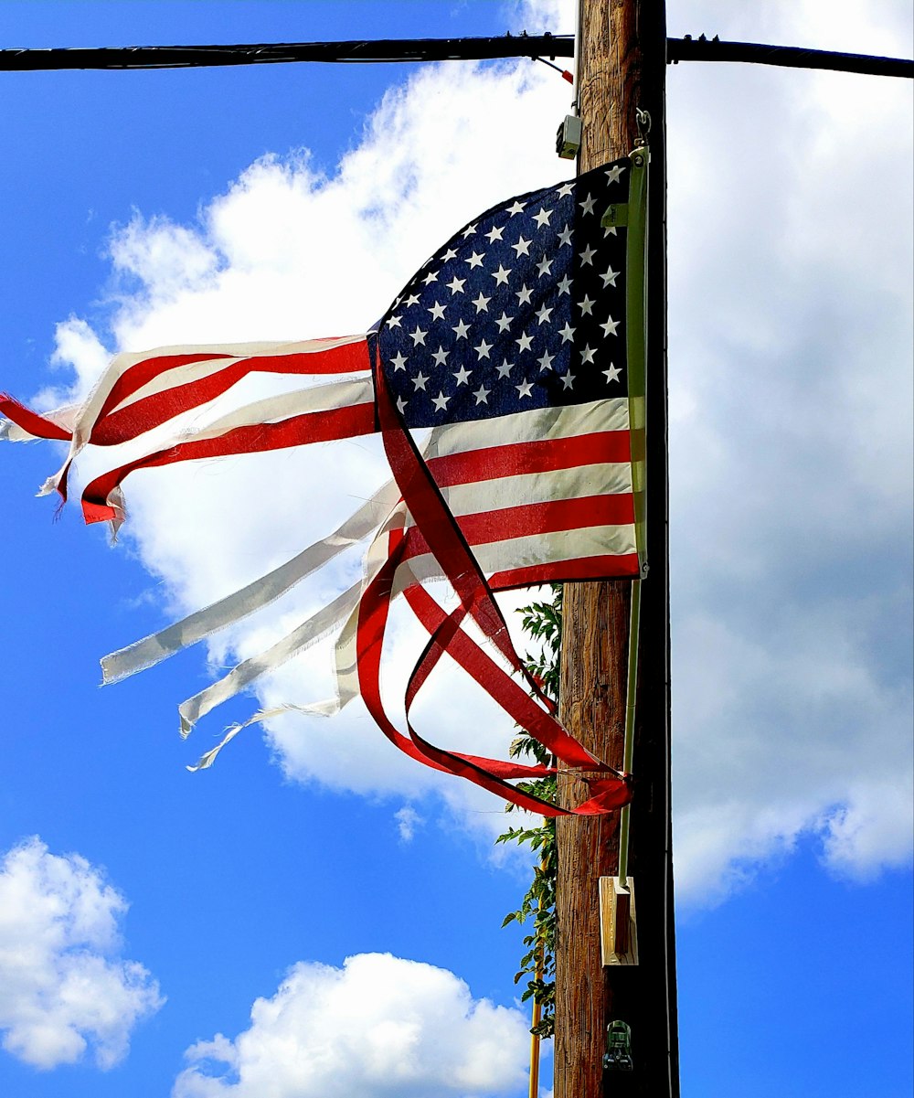 a couple of flags on a pole
