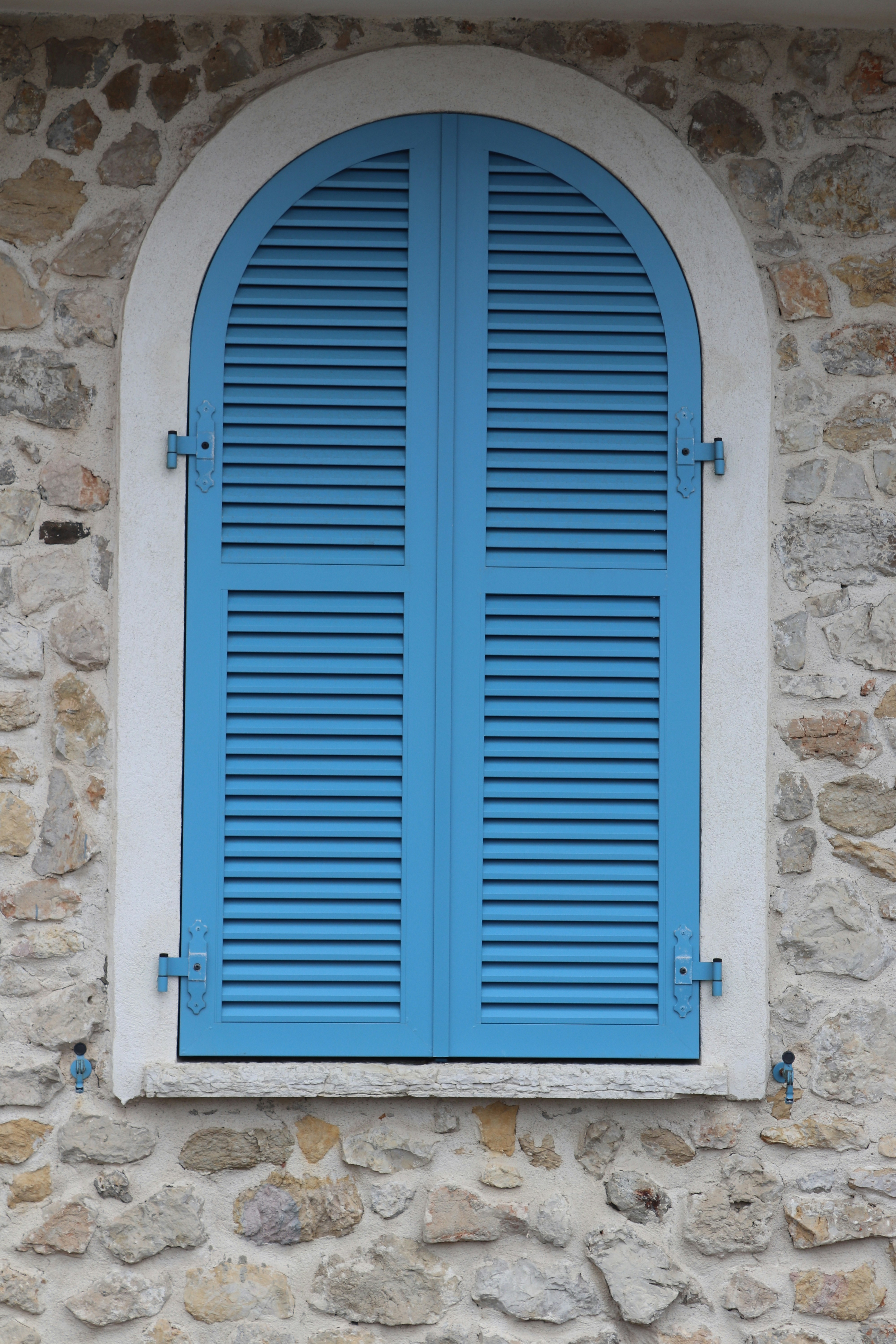 a window with a shutter