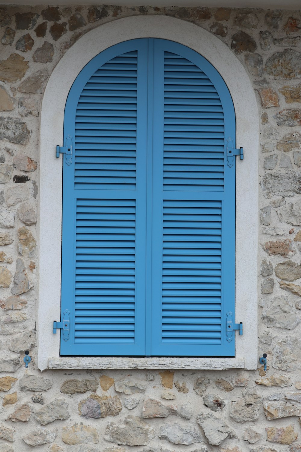 a window with a shutter