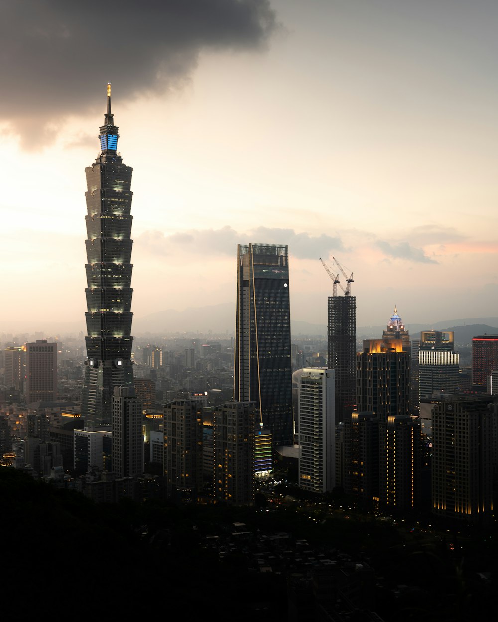 a city skyline at sunset