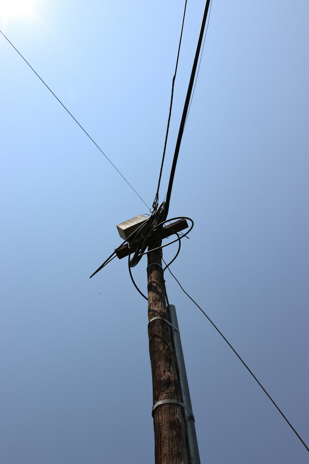 a person on a telephone pole